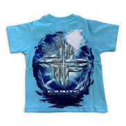 A light blue short-sleeve t-shirt with a large graphic on the front featuring a metallic silver cross, a dark blue circular water-like background, and the word 'SAINTS' printed below.