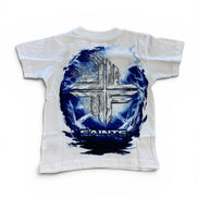 A white short-sleeve t-shirt with a large graphic on the back featuring a metallic silver cross inside a blue and white circular frame, with the word 'SAINTS' printed below.
