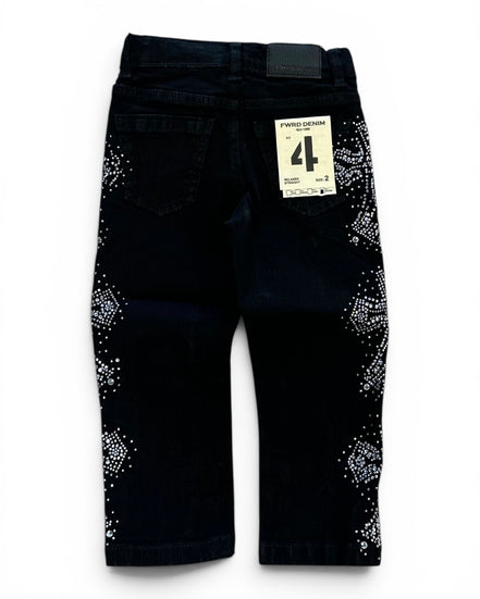 Black denim pants with white rhinestone embellishments on the outer thighs, shown from the back with a size 4 paper tag attached.