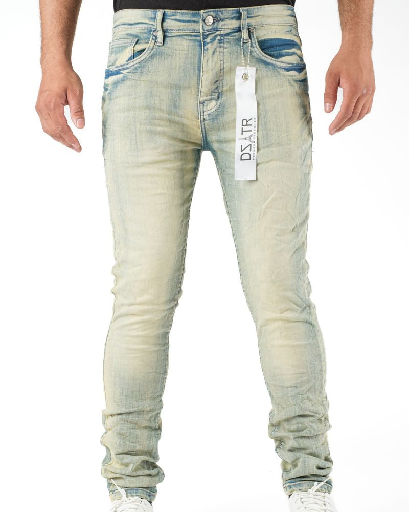 Light blue jeans with a brand tag on a white background
