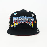 Black cap with colorful 'TOXICITY' text and graphics on a white background