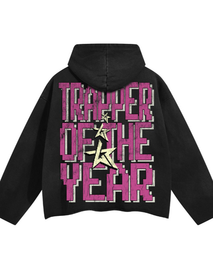 Black hoodie with 'Trapper of the Year' text on the back against a white background