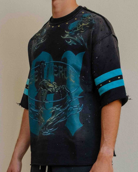Person wearing a black and blue graphic t-shirt with 'Pierce' branding.