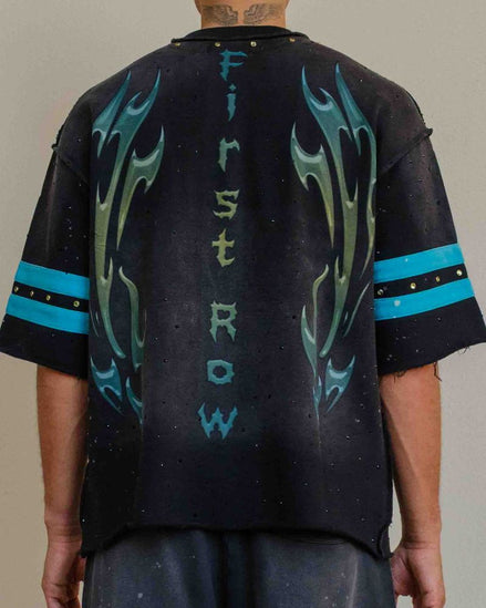 Black t-shirt with blue flame designs and text on a plain background