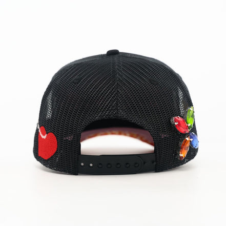 Trouble in Paradise Trucker Hat