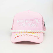 Trouble in Paradise Trucker Hat