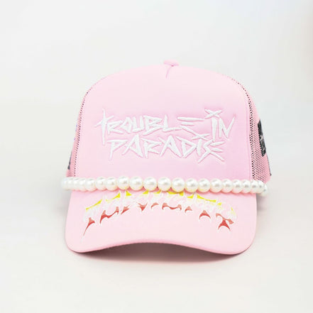 Trouble in Paradise Trucker Hat
