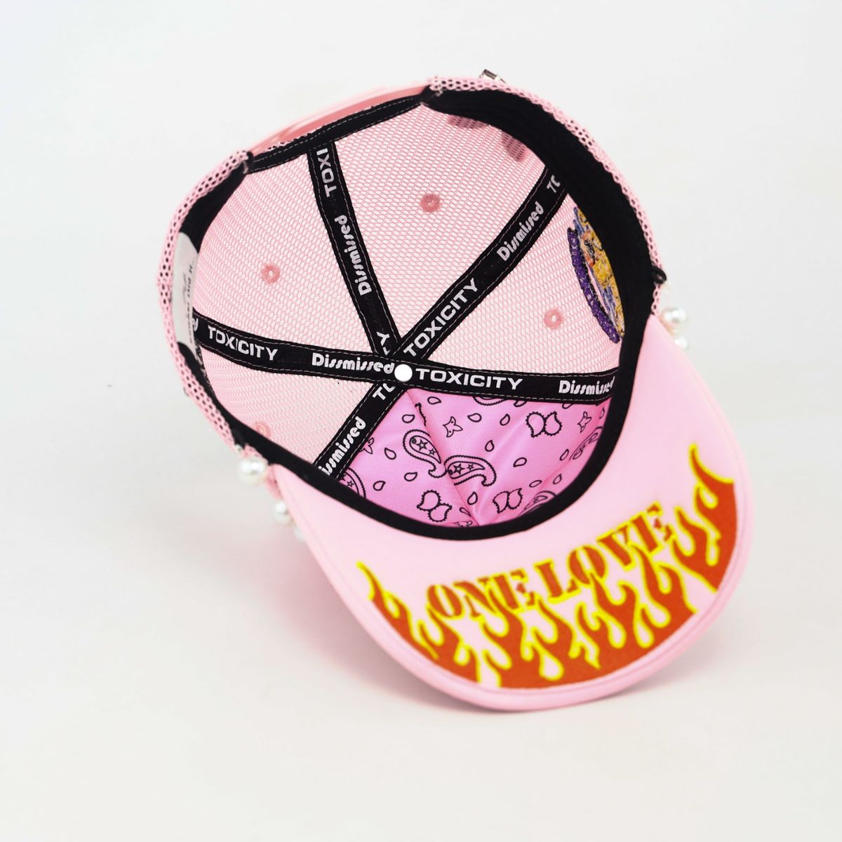 Trouble in Paradise Trucker Hat