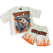 T-shirt and shorts set with skeleton design and 'Trust the Process' text on a white background
