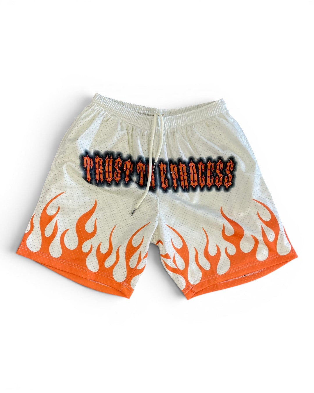 Beige shorts with orange flames and black text on a white background