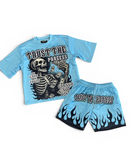Light blue t-shirt and shorts set with skeleton graphic and text on a white background