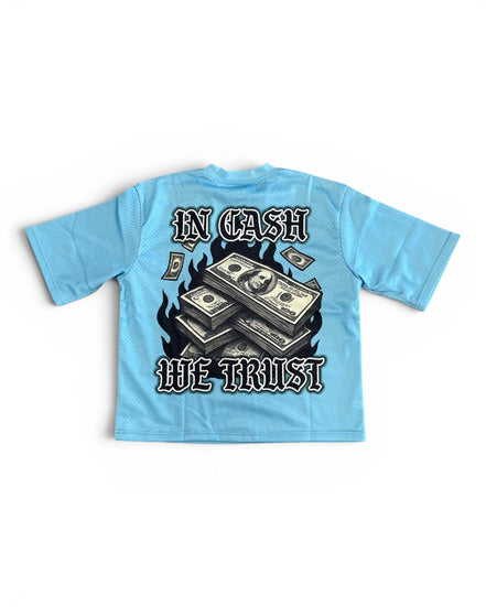 Light blue t-shirt with money graphic and 'In Cash We Trust' text on a white background