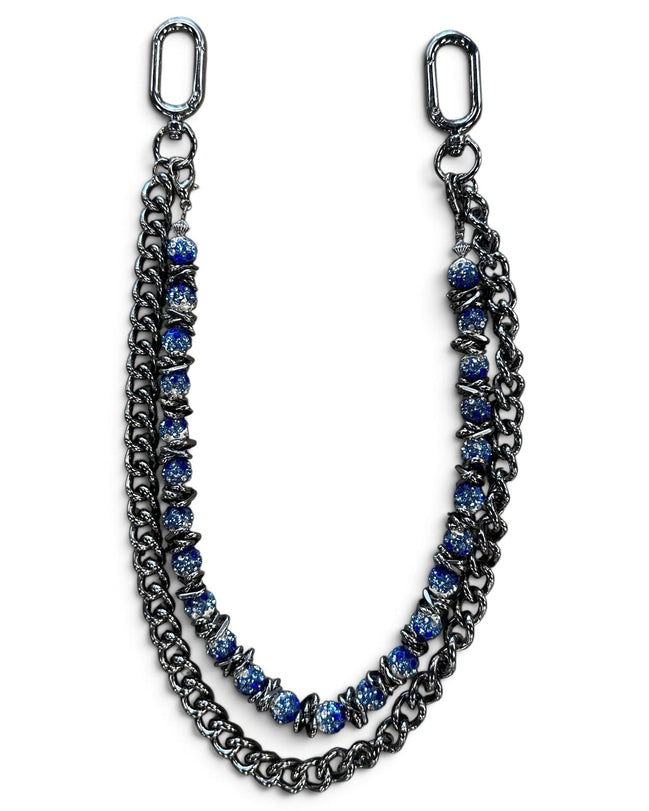 A double-strand chain bracelet featuring dark gunmetal silver-tone metal links and blue faceted beads, displayed on a clean white background.