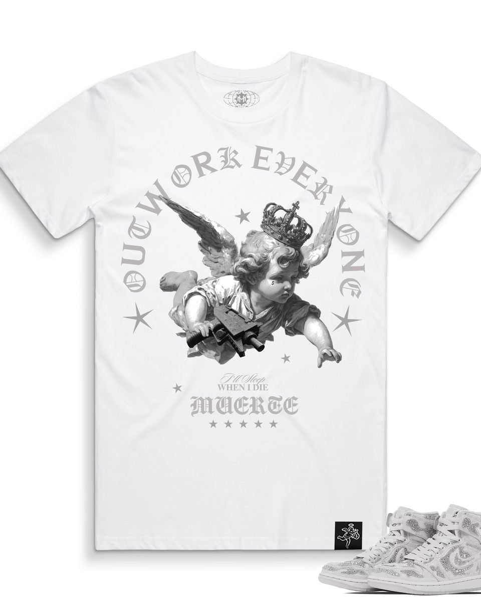White t-shirt with graphic design and matching sneakers on a white background