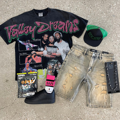SHIRT AND SHOTS SURROUNDED BY ACCESSORIES
