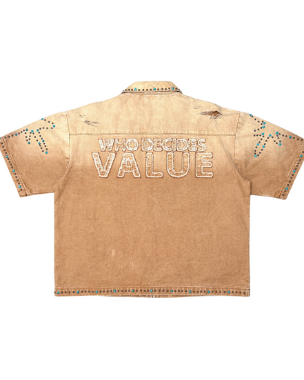 Beige shirt with 'WHO DECIDES VALUE' text on a white background