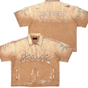 Beige denim shirt with 'WHO DECIDES VALUE' and 'RARE' text on a white background