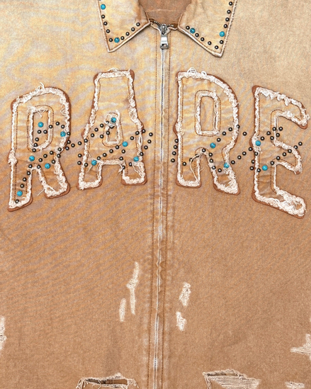 Brown jacket with 'RARE' text in white sequins and beads