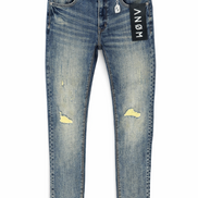 Blue jeans with a brand label on a white background