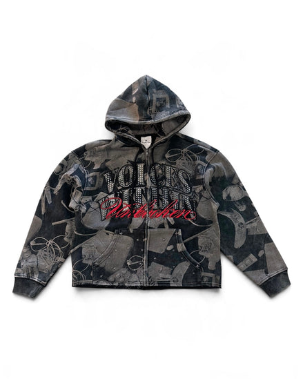 A cropped zip-up hoodie featuring a dark gray and black camouflage pattern with distressed details, a large 'Voices From The Streets' graphic on the chest, and ribbed cuffs and hem, shown flat on a white background.