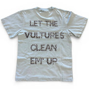 White t-shirt with black text 'LET THE VULTURES CLEAN EM' UP' on a white background