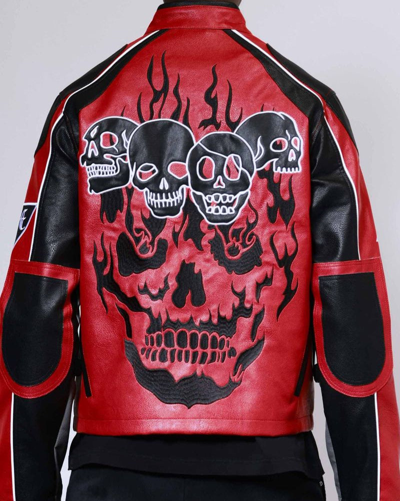 Red leather jacket with black skull designs on a gray background