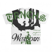 A white short-sleeve graphic T-shirt featuring a large black and green print with the text 'TRNCH'S' and 'Warborn' on a plain white background.