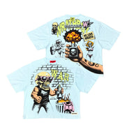 A light blue graphic t-shirt shown from both the front and back. The front features a large cartoon illustration of a skull character wearing sunglasses and a black tank top, with the word 'WAR' in yellow.