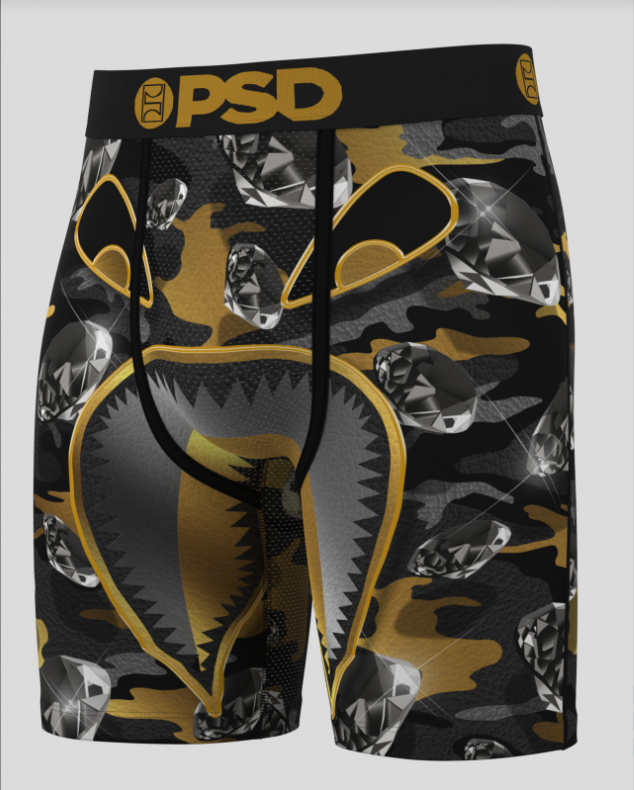 Black and gold patterned briefs with 'PSD' branding on a white background