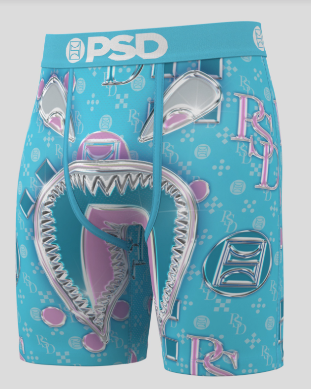 Blue swim shorts with shark and flamingo design on a white background