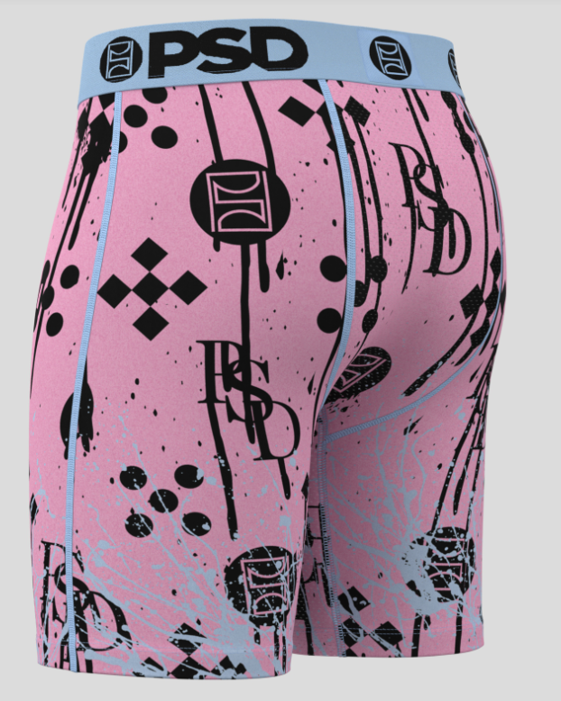 Pink boxer briefs with black graphics and 'PSD' branding on a light blue waistband.