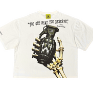 White t-shirt with graphic design of a skeleton hand holding a grenade and text on a white background