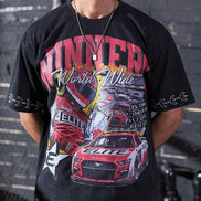 Person wearing a black t-shirt with racing-themed graphics and text.