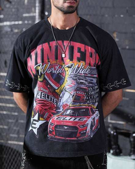 Person wearing a black t-shirt with racing-themed graphics and text.