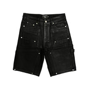 Black denim shorts with studded details on a white background