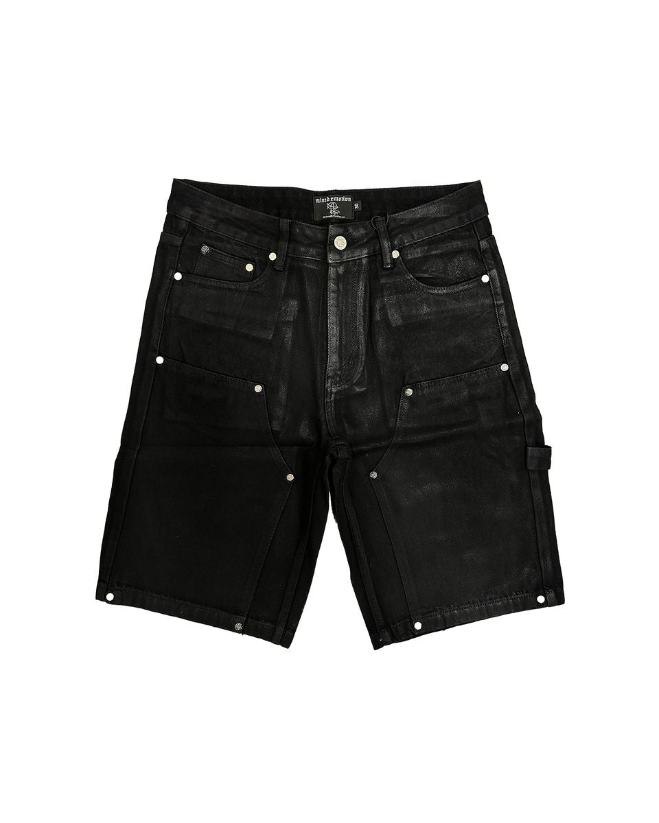 Black denim shorts with studded details on a white background