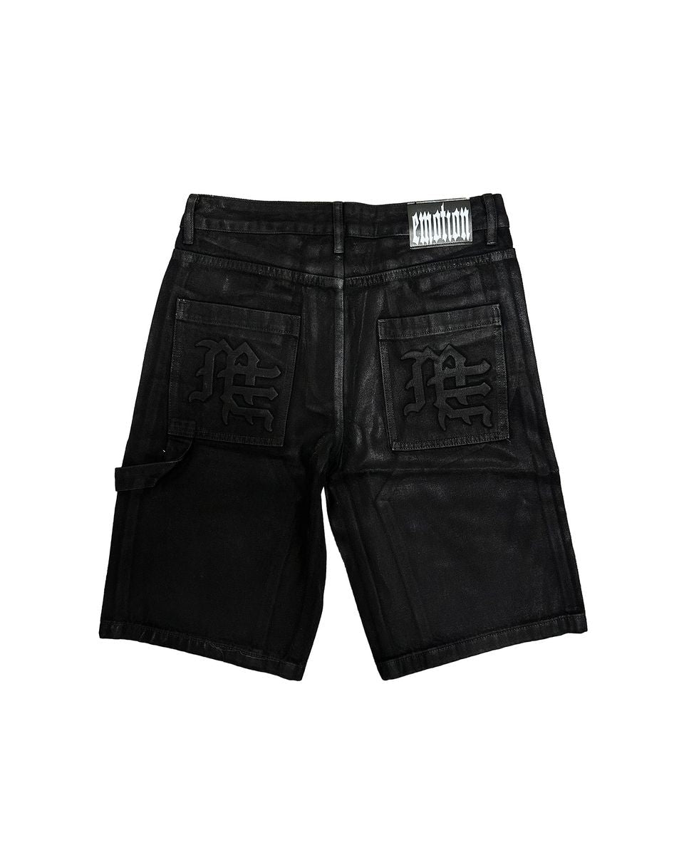 Black denim shorts with brand logo on a white background