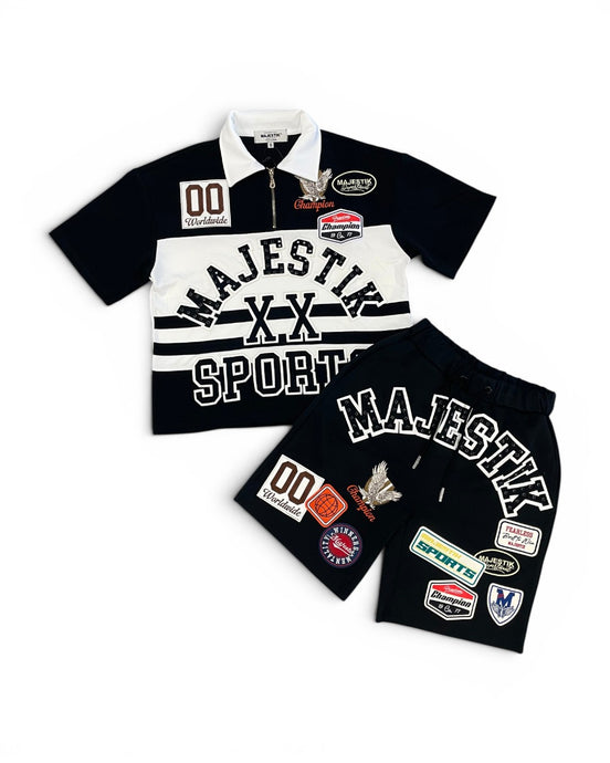 Black and white sports-themed outfit with patches on a white background
