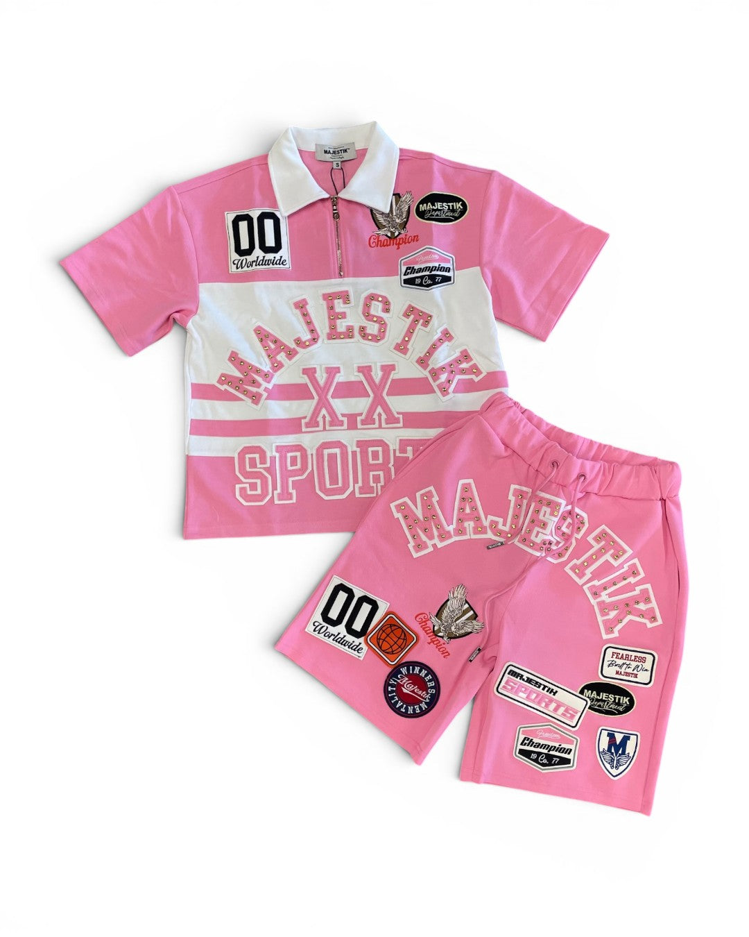 Pink sports outfit with 'Majestik' branding on a white background