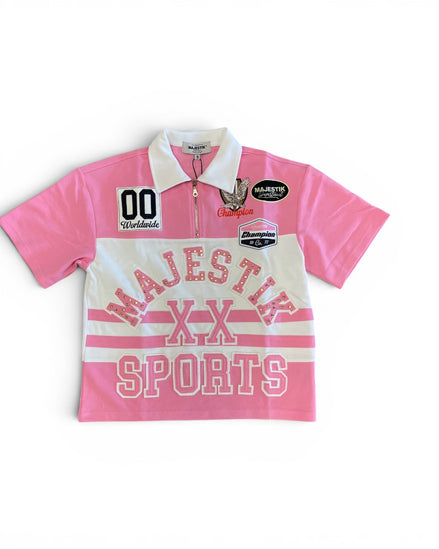 Pink and white sports jersey with 'Majestik Sports' branding on a white background