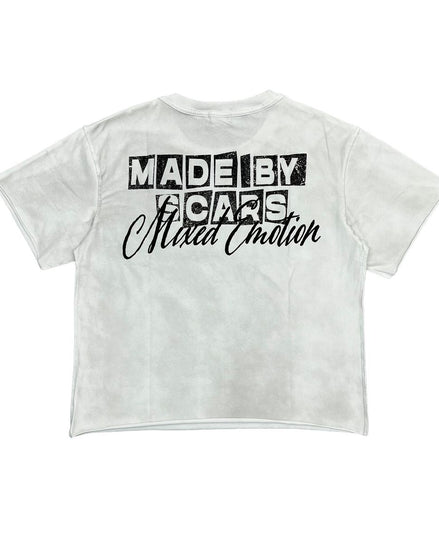 White crop top with black text on a white background