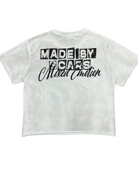 White crop top with black text on a white background