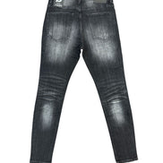 Back view of a pair of dark gray washed skinny jeans on a white background, featuring a visible 'ANOM' brand patch on the back waistband.