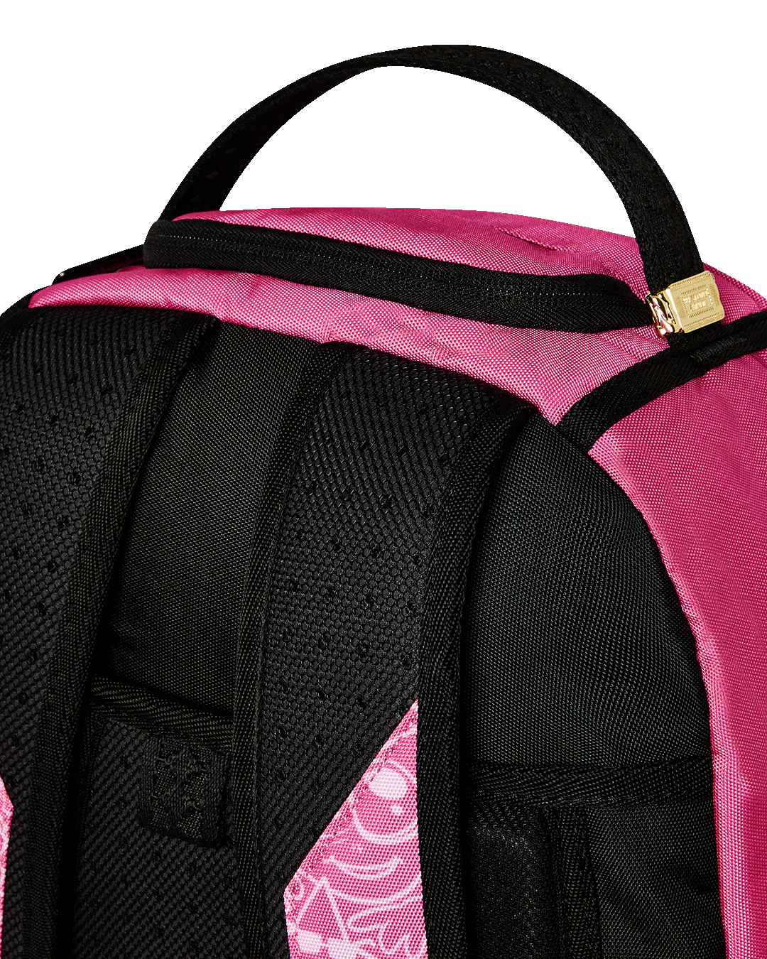 Close-up of a pink and black backpack with a visible brand logo.