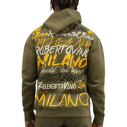 Person wearing a green hoodie with 'Milano' text on the back, on a white background