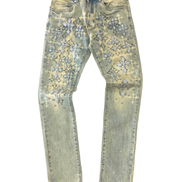 Light blue jeans with cross patterns on a white background