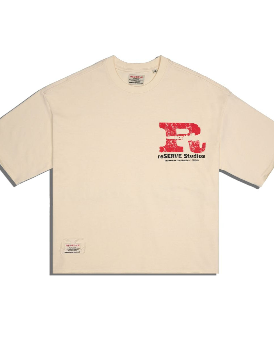 front of a bone color t-shirt with red and black logo on a white background