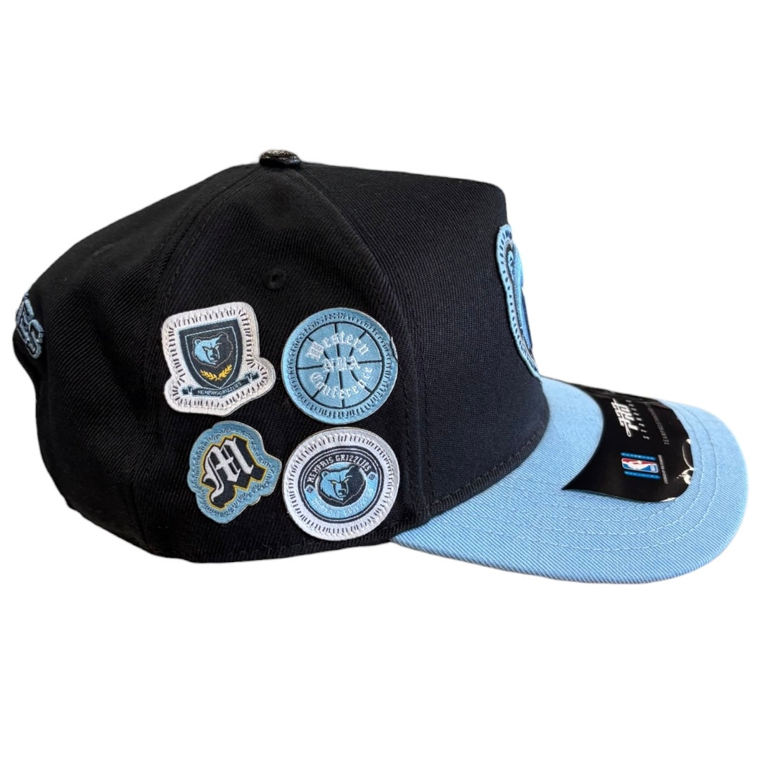 Black cap with patches and light blue visor on a white background