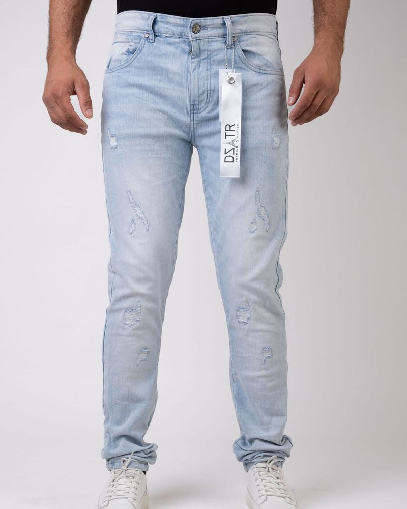 Light blue jeans with a brand label on a white background
