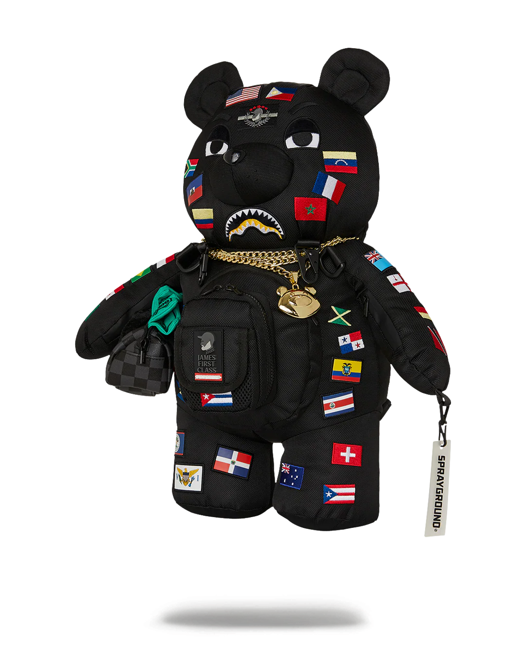 Black bear plush toy with international flags and accessories on a white background